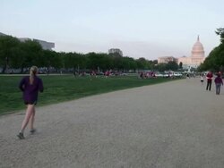 WS People jogging infront of Capitol  building  / Washington, District of Columbia, United States Stock Footage