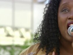  CU ZO Woman performing on outdoor stage  AUDIO / San Francisco, United States Stock Footage