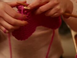 CU PAN Shot of Close up shot of wool to hands knitting / London, Greater London, United Kingdom Stock Footage