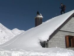 HD: Skiing On A Roof Stock Footage