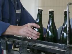 MS Champagne bottles on production line / Wiltingen, Saar-Valley, Rhineland-Palatinate, Germany Stock Footage