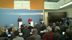 CLEAN : Merkel laments painful election year News Clip