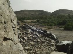 Through jagged Moroccan rocks, we see the scenic landscape and horizon. Stock Footage
