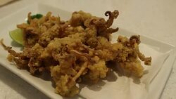 Eating fried squid japanese food Stock Footage