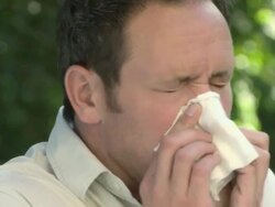 Man sneezing Stock Footage
