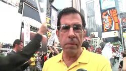 Coke dumped in Times Square to protest Coca-Cola's sponsorship of 2014 Winter Olympic in Russia News Clip