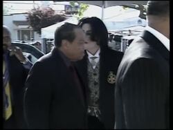 Singer arrives for another day in court News Clip