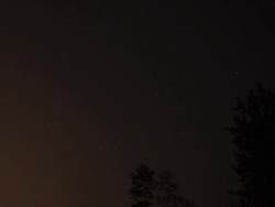 Time lapse of stars moving through night sky Stock Footage