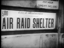 B/W 1940 close up 'Air Raid Shelter' sign / Westminster, England / educational Stock Footage