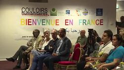 CLEAN : First Syria refugees land in France under corridor scheme News Clip