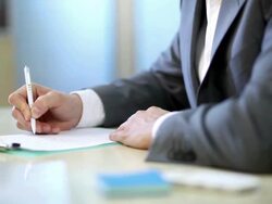 Businessman writing Stock Footage