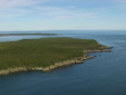 WS ARIEAL View of Island with sea coast / Maine, United States Stock Footage