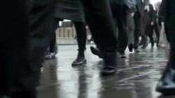 Commuters legs rain    COM Stock Footage