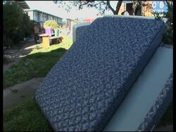 Crumbling cliff forces residents to flee apartment building News Clip