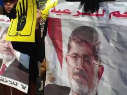 Female Egyptians chanting in support of Morsi Stock Footage