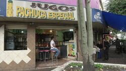 Tacos being made on street food stand News Clip