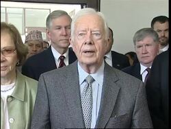 WRAP Monks praying for victims of crackdown ADDS Jimmy Carter heading observers' team News Clip