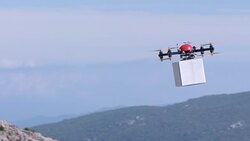 SLO MO Drone delivering a package Stock Footage