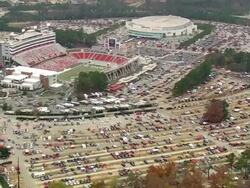 WS AERIAL View of Car parking area for Carter Finley Stadium - during game / North Carolina, United States Stock Footage