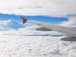 airplane Wing on flight over cloud Stock Footage
