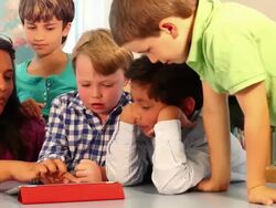 MS PAN Group of students working with their teacher on an tablet / Santa Fe, New Mexico, United States Stock Footage