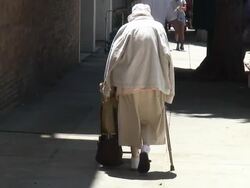 (HD1080i) Elderly Health Issues: Sore Legs, Hunched Back, Aging Stock Footage