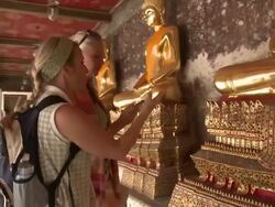 WS DS. MS Two women walking at Wat Phra Kaew (Temple of the Emerald Buddha), Bangkok, Thailand Stock Footage