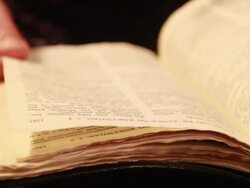 Close-up of a woman reading a bible. - Model Released - 1920x1080 - HD Stock Footage
