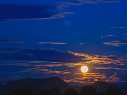 Timelapse:Rising moon.(panning) Stock Footage