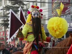 MS ZO Villagers dressed as ancient figures attend parade during shehuo celebrations, Shehuo is traditional festive folk celebration during chinese spring festival / xi'an, shaanxi, china Stock Footage
