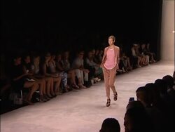Actress Milla Jovovich sits front row at Schumacher show News Clip