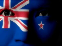 Beautiful girl New Zealand flag face painted Stock Footage