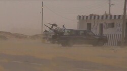 Rebels fleeing Ajdabiya after shelling by Gadhafi forces News Clip