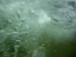 POV of a young man doing a backflip into a river watering hole. - Model Released - HD Stock Footage