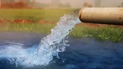 watering in the field during winter season Stock Footage
