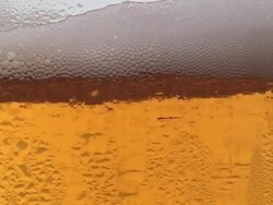 Close-up of beer glass background Stock Footage