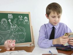 boy at work on the business plan Stock Footage