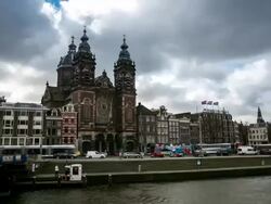HD time-lapse: Amsterdam Canal with Church of Saint Nicholas Stock Footage