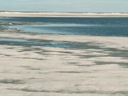 Ice melts in an inlet in the Arctic Circle by Igloolik Stock Footage