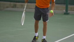 Tennis player practicing serve.  - Slow Motion Stock Footage