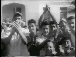 B/W 1959 crowd of people clapping outdoors / post-revolution Havana / newsreel Stock Footage