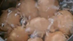 Cooking eggs in a pan Stock Footage