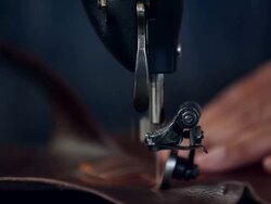 CU boot maker sewing boot shaft of cowboy boots Stock Footage