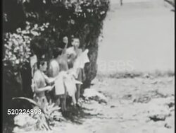 1945: OKINAWA, JAPAN: MS US Marine soldiers in row firing rifles. JUNE 22, 1945 SURRENDER: WS Japanese soldiers standing togther waving white flag. MS Armed US Marine looking over seaside cliff. Pacific Theater, WWII, World War II. Instructional Video