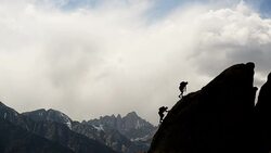 Friends out rock climbing Stock Footage