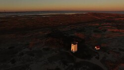 Above Lighthouse at Sunset Stock Footage