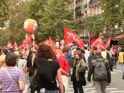 Demonstration in Paris. General strike in France 24 September 2010. Civil servants and private sector employees protesting government plans to raise the pension age from 60 to 62 years. Stock Footage