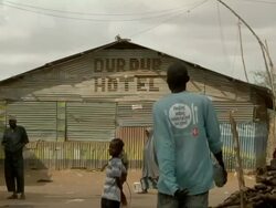 Primitive corrugated hotel front Stock Footage