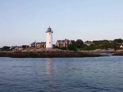Lighthouse, as seen from a boat, New England Stock Footage