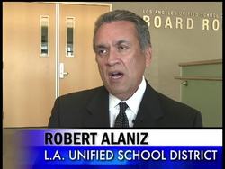 Three Los Angeles elementary school teachers accused of giving children portraits of O.J. Simpson, Dennis Rodman and RuPaul to carry in a Black History Month parade. News Clip